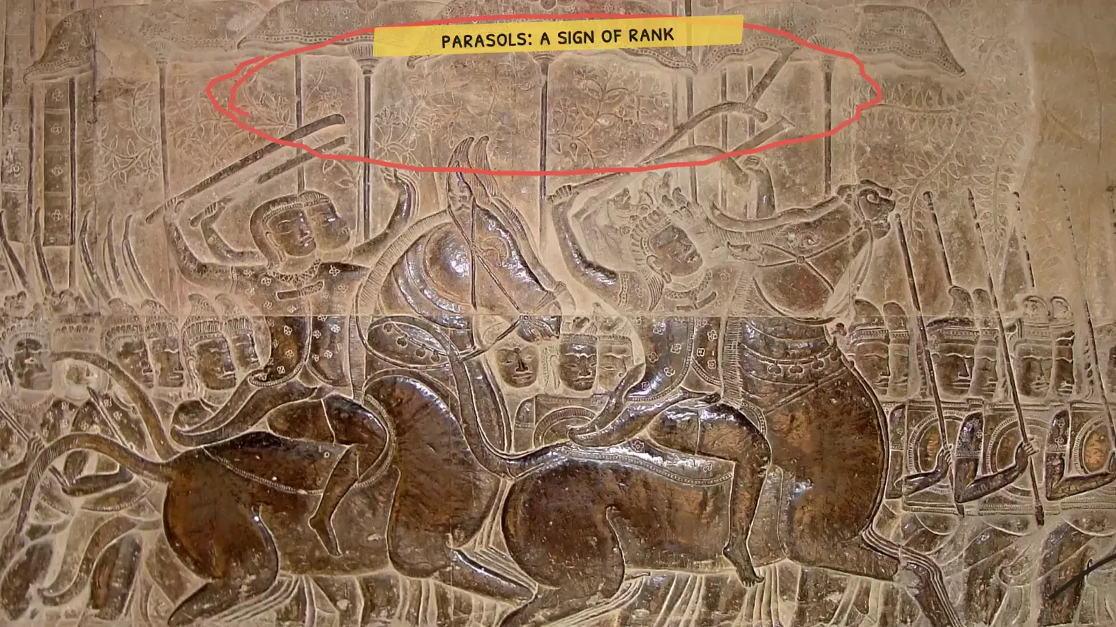 Detail of the Angkor Wat bas-relief: Khmer commanders riding under parasols